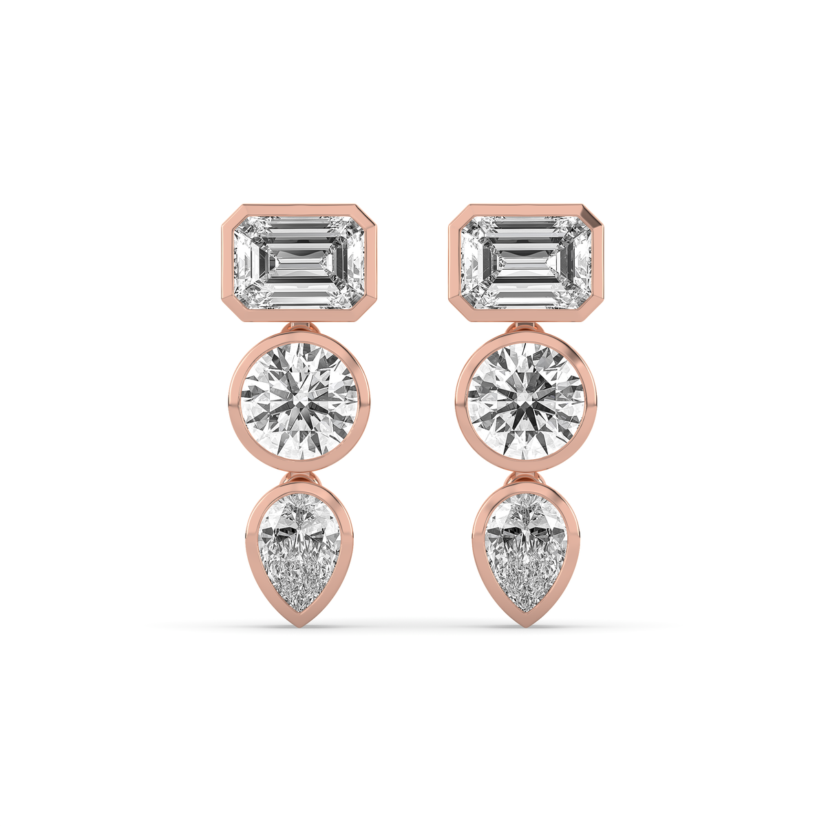 14k yellow gold drop earring with an emerald-cut, round, and pear-shaped lab-grown diamond arranged vertically