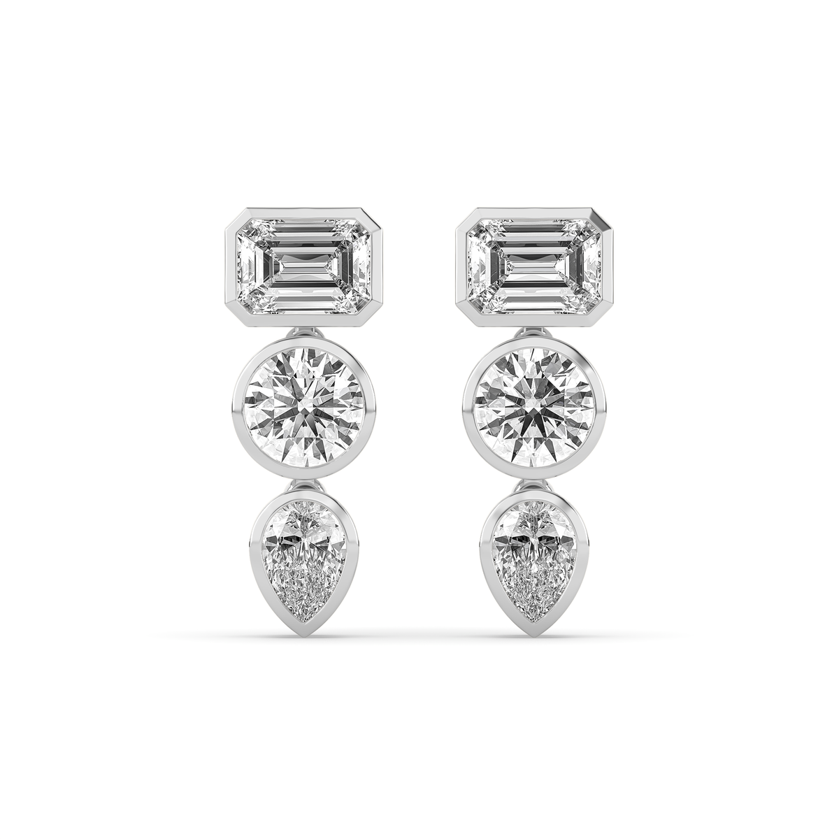 14k yellow gold drop earring with an emerald-cut, round, and pear-shaped lab-grown diamond arranged vertically