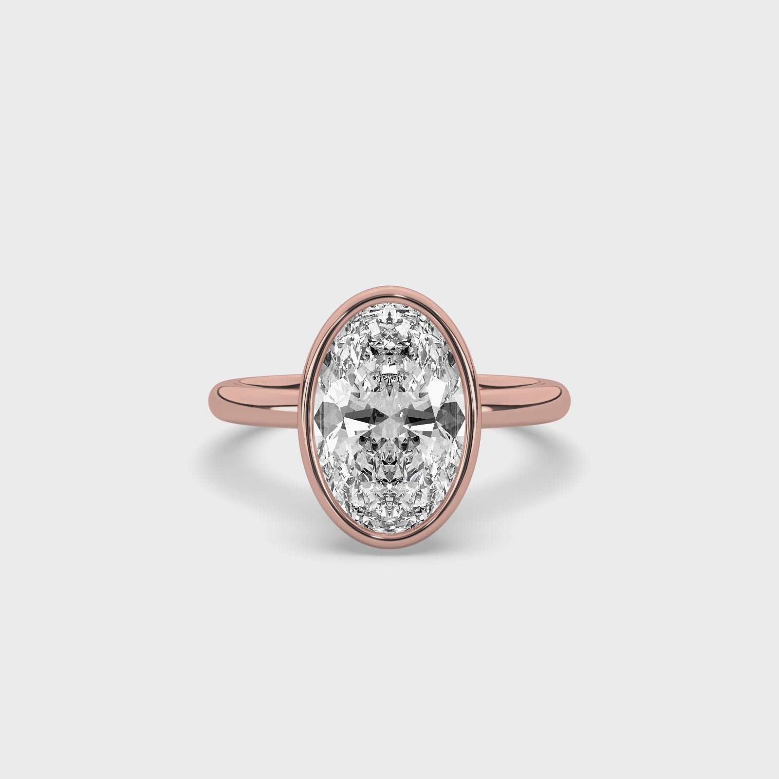 product video of ALVA Bezel Oval Diamond Solitaire Ring in rose gold in a white background