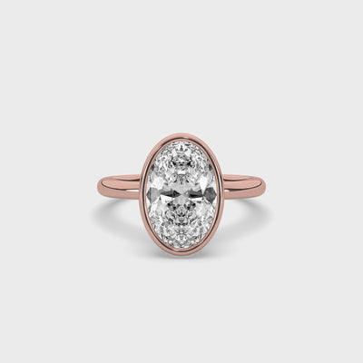 product video of ALVA Bezel Oval Diamond Solitaire Ring in rose gold in a white background
