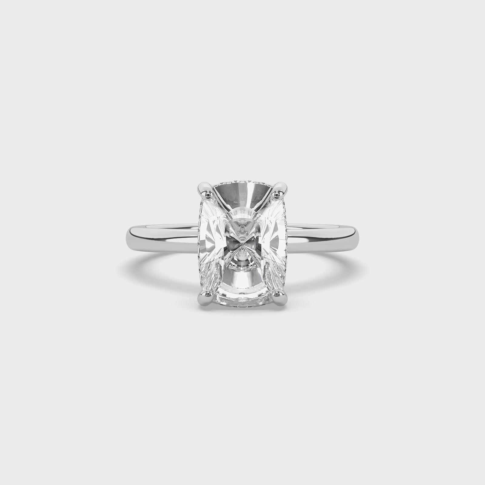 product video of ALVA Elongeted Cusion & Hidden Halo Engagement Ring in white gold in a white background.
